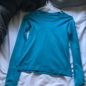 Swiftly tech long sleeve waist length